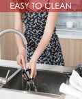 Turn Your Stand Mixer Into A Legit Slow Juicer With This Masticating Attachment, woman washing juicer part under sink