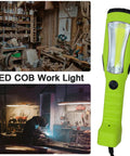 Image showing Ultra Bright 1200 Lumen COB LED Work Light With 25 Foot Heavy Duty Cord, Handheld Design, Magnetic Base, in a workshop.