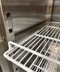 Heavy Hitter Commercial Merchandiser Freezer With Three Self Closing Glass Doors and Bulletproof Adjustable Shelving close-up of steel rack