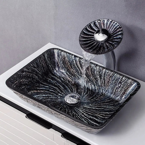 USZWBY Bathroom Vessel Sink, Tempered Glass Artistic Vessel Bowl Sink with Waterfall Faucet and basin, black textured design.