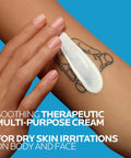Application of the Ultimate Go To Healing Balm With Vitamin B5 Soothing Cream on arm for dry skin irritations.