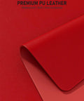 Close-up of bright red PU leather texture for Bright Red Desk Pad 23.6 By 13.8 Inch PU Leather Non Slip Desk Mat For Laptop Mouse Keyboard Writing And Gaming Waterproof Office And Home Use Everyday Dope