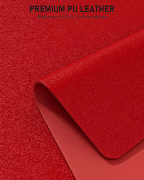 Close-up of bright red PU leather texture for Bright Red Desk Pad 23.6 By 13.8 Inch PU Leather Non Slip Desk Mat For Laptop Mouse Keyboard Writing And Gaming Waterproof Office And Home Use Everyday Dope