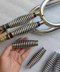 Premium Heavy Duty Bicycle Front Fork Springs 2 Piece 5mm Thick Compression Coil Shock Absorbers Lowrider Custom Builds displayed with hand.
