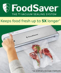 Compact Vacuum Sealer With Airtight Bags And Roll Keeps Food Fresh Up To 5X Longer sealing lamb chops on countertop