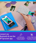 Pocket Sized Photo Printer For Instant Two By Three Inch Sticky Back Photos From Your Phone On The Go Luna Pearl Edition in use