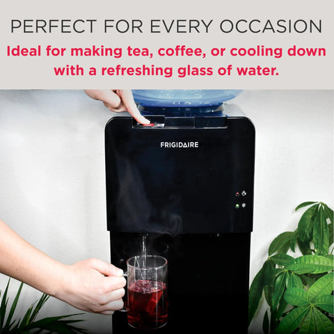 Person using a top loading water cooler dispenser with hot and cold water and child safety lock, pouring hot water into a glass mug.