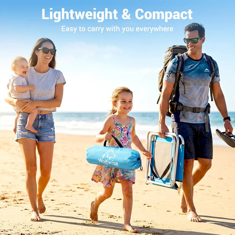 Family carrying Large Beach Tent Sun Shelter For Three To Four People With UPF 50 Plus UV Protection on a sunny beach.