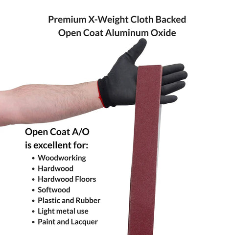 2 X 42 Inch Flexible Aluminum Oxide Sanding Belts held by gloved hand, ideal for woodworking and light metal working.