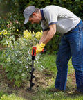 Person using Heavy Duty 4 By 16 Inch Garden Auger Drill Bit For Planting And Post Hole Digging Spiral Bulb Planter Tool outdoors