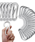 Hand holding one of the 50 Pack Heavy Duty Carabiners M8 Five Sixteenths Inch Diameter Spring Snap 3 Inch Length Zinc Galvanized Steel Clips for Hammock Swing Fitness Gym Outdoor Boating Ideal For Hammock And Swing Sets Fitness Equipment Outdoor Gear Marine Use And General Use, with other carabiners in the background.