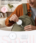 Person placing Wireless MagSafe Charger For iPhone 12-17 And AirPods Pro into backpack, showcasing compact 1.60 oz design.