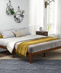 Rock Solid King Platform Bed Frame 14 Inch Profile Genuine Rubber Wood Heavy Duty Slat Support Premium Mattress Foundation No Box Spring Needed Hassle Free Setup Dark Walnut in a stylish bedroom setting.