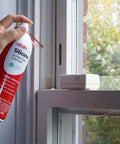 Person using Silicone Lubricant With Teflon Fluoro Polymer For Non Metal Materials on window frame to prevent sticking
