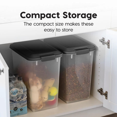 Two Pack Dog Food Storage Containers With Airtight Seal And Rolling Wheels Holds Up To 30 Lbs Each One Hand Open BPA Free Made In USA Clear And Black shown in kitchen cabinet