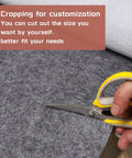 Oversized Garage Floor Mat For Under Your Car, 8.8 By 22 Feet, Grippy Non Slip Waterproof Oil Absorbent Parking Mat being cut for size.