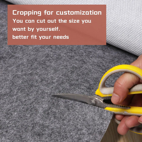 Oversized Garage Floor Mat For Under Your Car, 8.8 By 22 Feet, Grippy Non Slip Waterproof Oil Absorbent Parking Mat being cut for size.