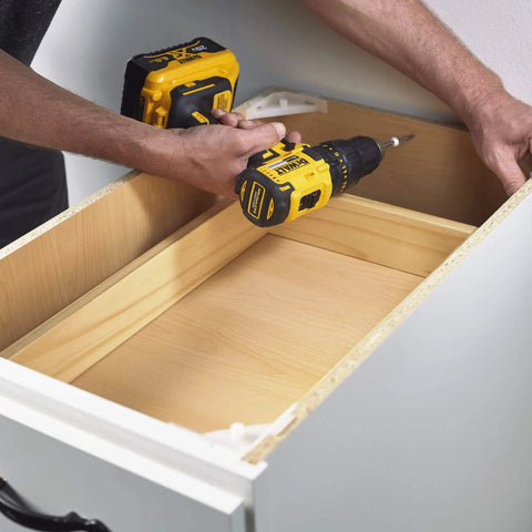 #9 X 3 Inch Saberdrive White Cabinet Wood Screws One Pound Pack used with a drill for assembling a wooden drawer.