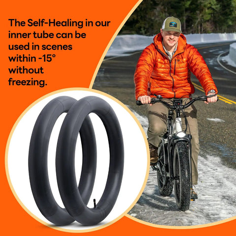 2 Pack Self Sealing Fat Bike Inner Tubes For 20x2.5 To 3.0 Tires With 32mm Schrader Valve, man biking on icy road