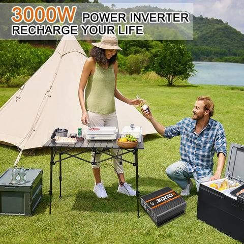 3000W Power Inverter DC 12V to 110V AC for RVs, Semis and Trucks at campsite with people enjoying food and drinks.