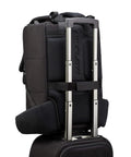 Cineluxe Backpack 21 Fast Access Pro Camera Backpack With Ultra Wide Doctor Bag Opening attached to rolling luggage handle