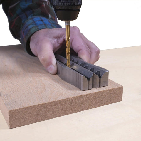 All Metal Handheld Drill Guide For Straight Holes With Twenty Five Drill Guides In One One Eighth To One Half Inch In Sixty Fourth Inch