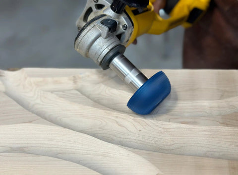 Badass Two Inch Tungsten Carbide Contour Wheel For Die Grinders shaping wood surface during material removal.