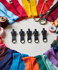 12 Piece Black Zip Puller Repair Kit For Zippers No Sweat Instant Slider Replacement Set with colorful zippers and sewing tools.