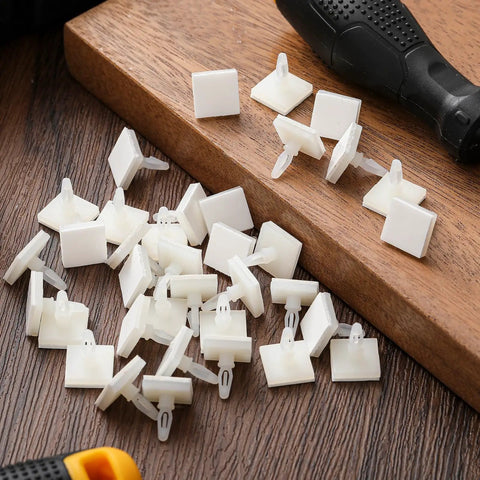 100 Pcs Sticky PCB Spacers Adhesive Insulated Standoffs 0.25 Inch Height displayed on wooden surface with tools