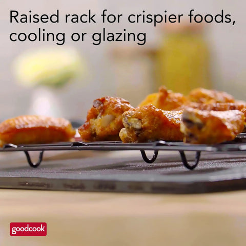 Nonstick 15 X 10.5 Inch Baking Pan With Raised Wire Rack For Crispy Bacon, Chicken And Fries, shown with chicken wings