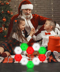Children with Santa and Christmas tree, using Hexagon LED Wall Panels 6 Pack With Remote And Touch Control, 13 Color RGB Modular DIY Wall Lights USB Powered for Autism Sensory Room, Dope Game Room Party Decor Vibe illuminating floor.