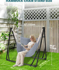 Woman relaxing on 2 in 1 Hammock and Swing Chair with Collapsible Steel Stand, ideal for indoor and outdoor use, rust-resistant frame.