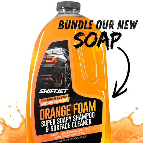 Orange bottle of car wash soap, labeled "Orange Foam Super Soapy Shampoo & Surface Cleaner," with suds and "Bundle Our New Soap" text.