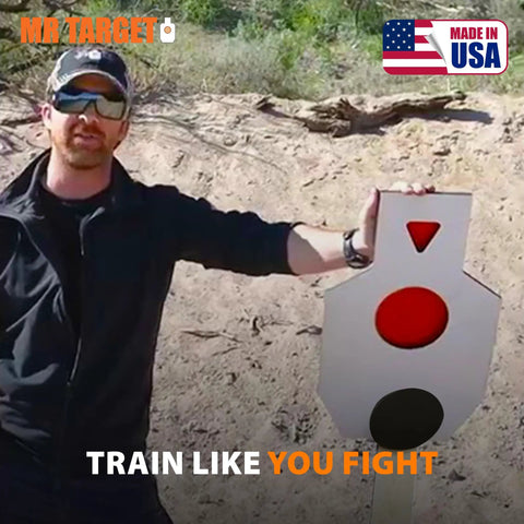 Man outdoors holding the Beefy AR500 Steel Target Silhouette Built Tough For Real Range Sessions 12 By 20 Inches with 6 Inch Center Paddle.