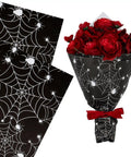 Spooky Spider Web Floral Wrapping Paper 18x18 Inches Black White Bouquet Wrap with red flowers for Halloween Gifts.
