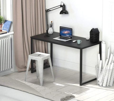 Space Saving 40 Inch Home Office Desk For Computer Setup Black Durable Powder Coated Steel Frame Ideal For Small Rooms Dorms And Home Offices Fits Laptop Monitor And Essentials With A Clean Sleek Look shown in a small office setting.