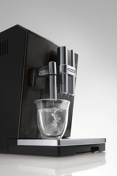 Real Deal Fully Automatic Espresso Machine With Single Touch Lattecrema Setup For Creamy Cappuccino Foam Black Coffee Maker pouring water.