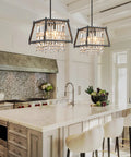 Farmhouse Crystal Pendant Light Chandelier In Black Metal For Kitchen And Dining Room Dope Industrial Vibe Fixture installed over kitchen island