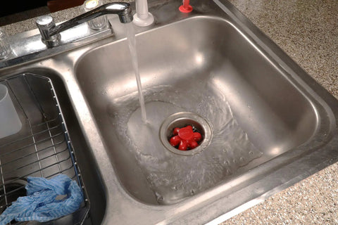 Disposal Genie II Garbage Disposal Strainer And Stopper, Kitchen Sink Drain with Splash Guard, Black Finish in use