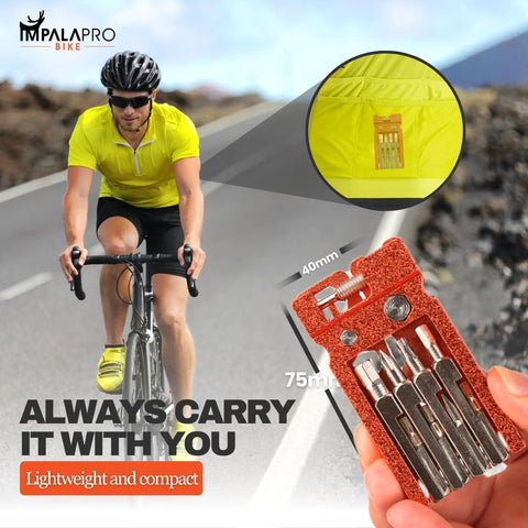 Cyclist holding Lightweight 20 In 1 Bike Multitool Kit In Orange With Chrome Vanadium Construction compact in pocket.