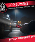 Person holding R-300 LED Emergency Flashlight with 300 lumens beam during night near parked cars