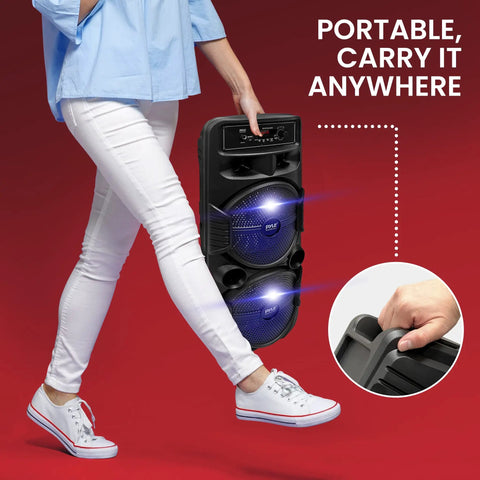 Person carrying Beast 600W Peak Portable Bluetooth PA Speaker System With Dual 8 Inch Subwoofers And 1 Inch Tweeter