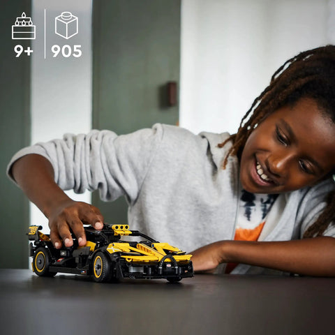 Child playing with Bugatti Bolide Racing Car Building Set For Kids And Teens A Totally Cool Engineering Toy Back To School Gift Collectible Sports Car Construction Kit Ages 9 Plus 42151