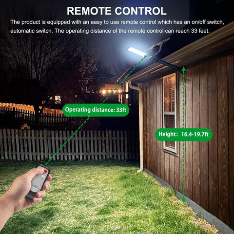 Person using remote control for Solar Street Light Outdoor 15000 Lumen Flood Light IP67 Waterproof On building wall at night