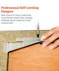 Professional Self-Leveling Hangers in use for odd-sized wood frames, part of Boss Level Picture Hangers For Drywall And Plaster, Heavy Duty Self Leveling Brackets Hold Up To 60 Lbs, Flush Mount Design Keeps Frames Straight, Ready Five Piece Wall Hang Kit.