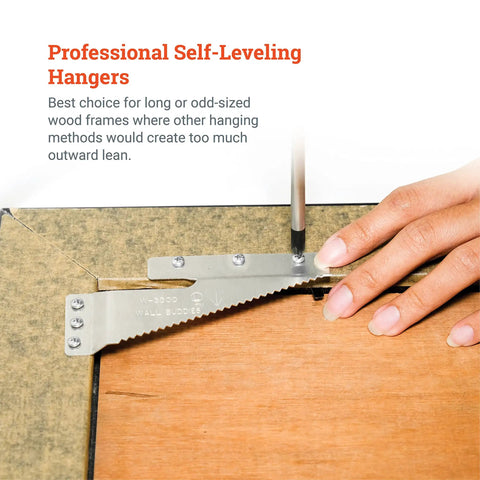 Professional Self-Leveling Hangers in use for odd-sized wood frames, part of Boss Level Picture Hangers For Drywall And Plaster, Heavy Duty Self Leveling Brackets Hold Up To 60 Lbs, Flush Mount Design Keeps Frames Straight, Ready Five Piece Wall Hang Kit.
