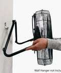 20 Inch High Velocity Garage Floor Fan With Tilt Adjustable Head being mounted, showing side view, wall hanger not included