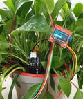 Capacitive Soil Moisture Sensor for Arduino in plant pot, corrosion-resistant moisture detector for DIY garden projects