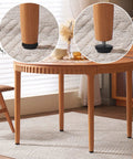 Kick The Wobble To The Curb With These 16 Pack Stainless Steel Adjustable Threaded Furniture Leveler Feet And Screw On Glides For Reliable Table Chair Cabinet Stability on a wooden table leg.