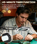 Man using 10X Magnifying Lamp With Stand And LED Light 2 In 1 Pro Grade Hands Free Desk Clamp Lamp, timer feature visible